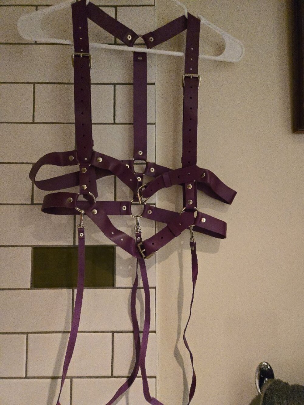 Expertly handmade leather body harness in purple